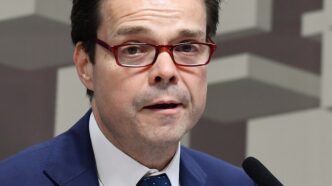 Nilton David, diretor de política monetária do Banco Central, em evento em Washington, discutindo incertezas econômicas e política monetária apertada.