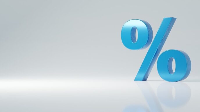 Gráfico com percentuais de taxas de juros em alta e baixa, indicando a volatilidade do mercado financeiro.