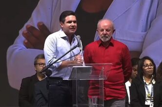 Arthur Lira e Lula em evento no Rio de Janeiro, após vaias ao presidente da Câmara.