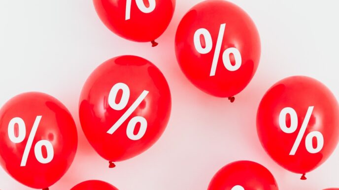 Gráfico de taxas de juros e percentual, indicando alta nos juros futuros.