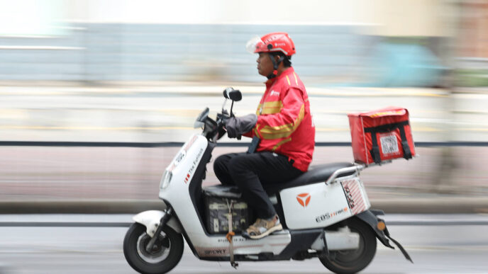 trabalho de entregador na China — foto ilustrativa