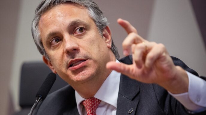 Diagrama financeiro mostrando fluxo de capital e impostos sobre dividendos, relacionado à isenção de estoque de lucro.