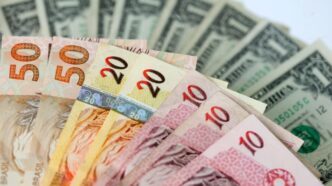 dólar cai ante real — foto ilustrativa